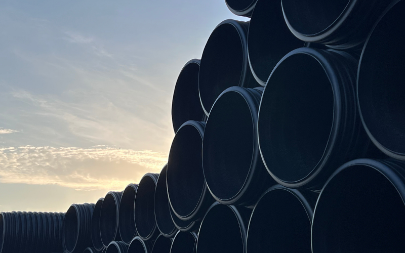 TDR Ultra HDPE corrugated pipe for storm drain stacked at distribution center