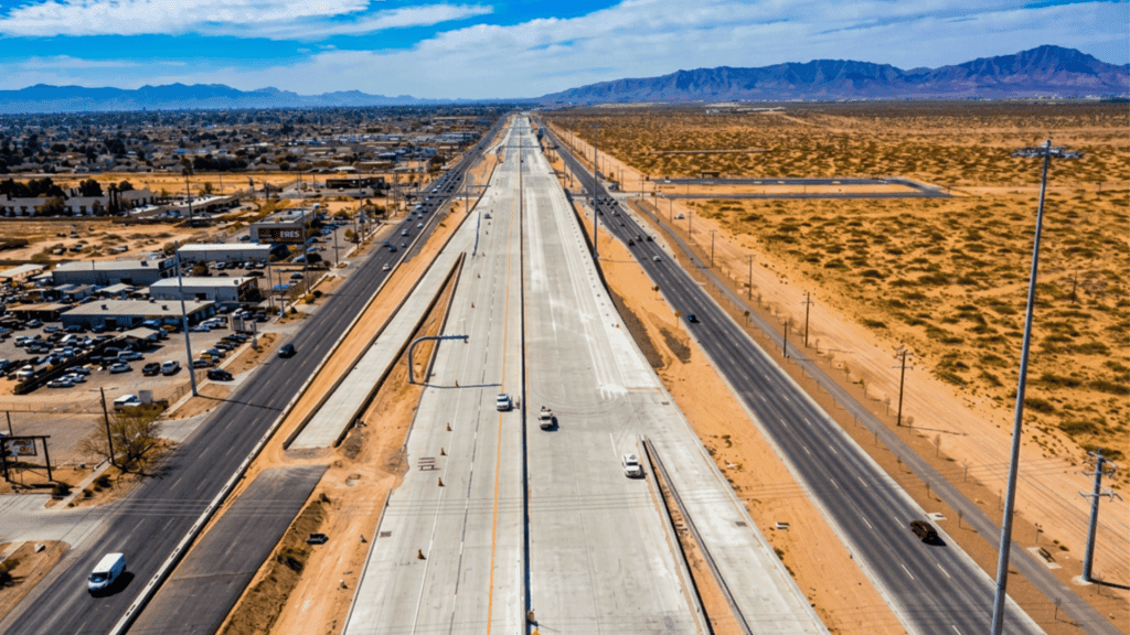 Highway drainage El Paso — crew installing TDR ULTRA corrugated HDPE drainage pipe along the Montana Avenue Expansion Corridor, El Paso, Texas
