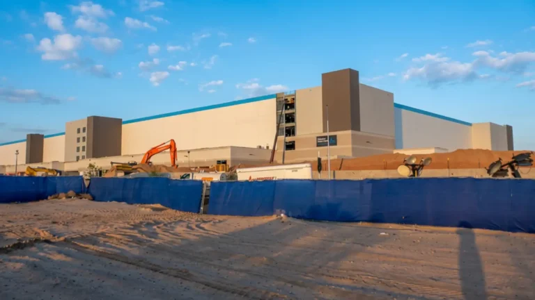 Distribution center drainage El Paso — TDR ULTRA 18–48 in corrugated HDPE pipe being installed at the Amazon West Delivery Station, El Paso, Texas