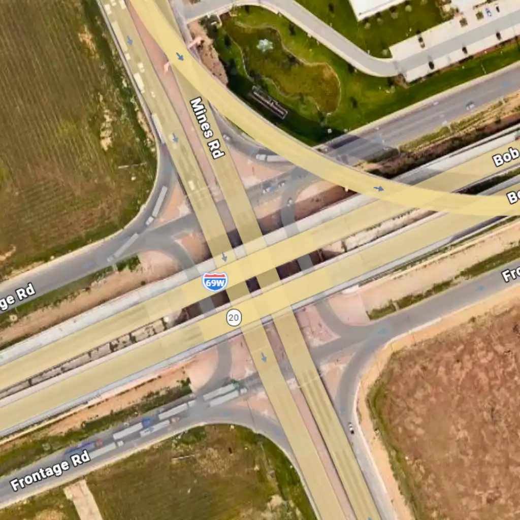 Logistics corridor drainage Laredo — TDR ULTRA HDPE trunk lines set beneath a heavy-freight corridor on Mines Rd, Laredo, TX