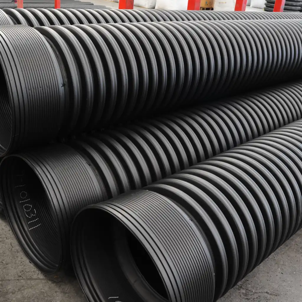 Rail park drainage Elmendorf — crew installing TDR ULTRA corrugated HDPE drainage pipe during a build-to-suit phase at Alamo Junction Rail Park, Elmendorf, Texas