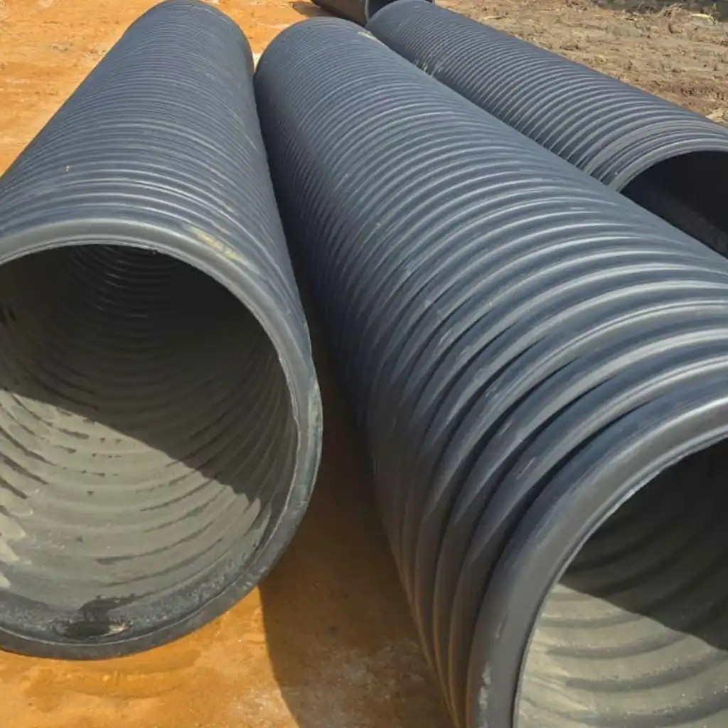 Retail site drainage El Paso — crew installing TDR ULTRA corrugated HDPE drainage pipe at the Montana Commons retail and office development, El Paso, Texas