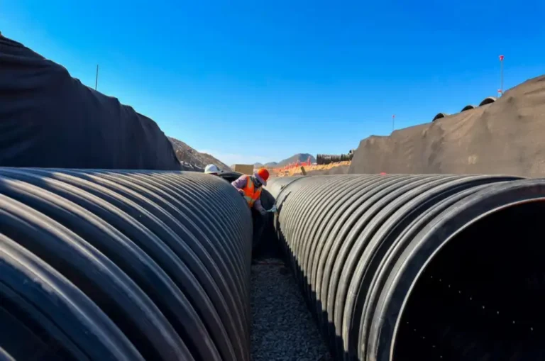 TDR ULTRA perforated and solid HDPE pipe used in a French drain system